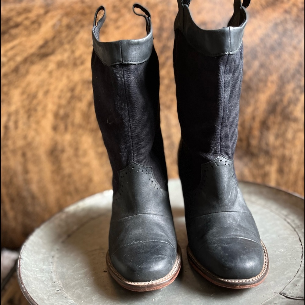 J Shoes heeled black boot. Genuine leather on foot, canvas on top. Barely worn.